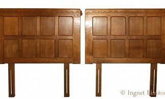 ROBERT MOUSEMAN THOMPSON A PAIR OF OAK PANELLED HEADBOARDS