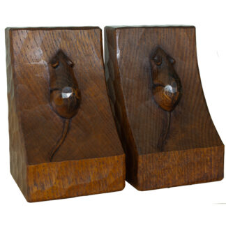 A PAIR OF ROBERT MOUSEMAN THOMPSON OAK BOOKENDS
