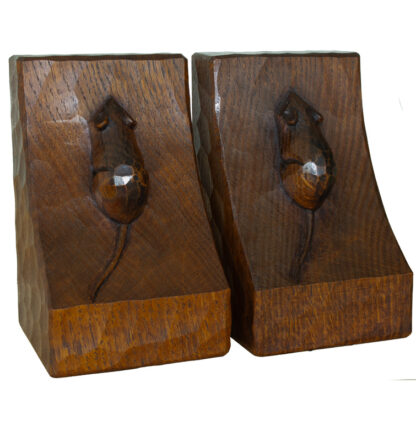 A PAIR OF ROBERT MOUSEMAN THOMPSON OAK BOOKENDS