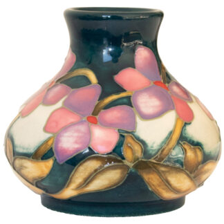 A MINIATURE MOORCROFT SUMMER ROSETTE VASE DESIGNED BY KERRY GOODWIN
