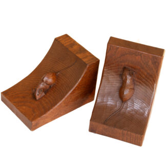 A VINTAGE PAIR OF ROBERT MOUSEMAN THOMPSON OAK ADZED BOOKENDS