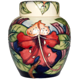 A MOORCROFT SIMEON RED GINGER JAR DESIGNED BY PHILIP GIBSON