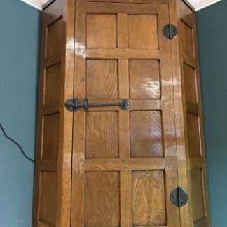 ROBERT MOUSEMAN THOMPSON  OAK HANGING CORNER CUPBOARD 